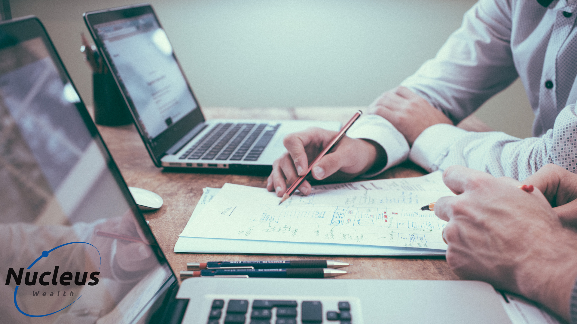 Financial adviser discussing fees